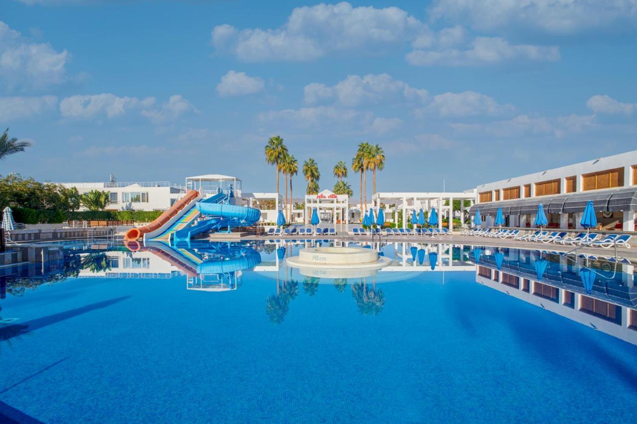 Maritim Jolie Ville Resort & Casino Sarm es-Sejk Kültér fotó A swimming pool at a hotel in Crete, Greece